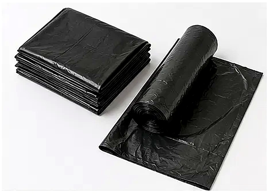 Folded and rolled black trash bags